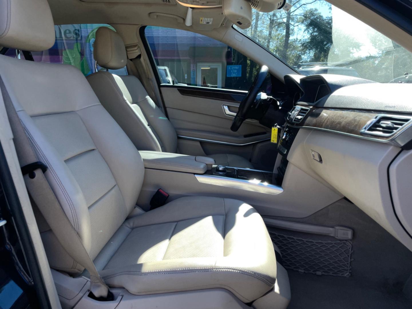 2014 BLUE MERCEDES-BENZ E-CLASS E 350 LUXURY 4MATIC (WDDHF8JB1EB) with an 3.5L engine, Automatic transmission, located at 5103 Dorchester Rd., Charleston, SC, 29418-5607, (843) 767-1122, 36.245171, -115.228050 - Beautiful & Clean Interior with Leather, Sunroof, Navigation, Backup Camera, Push button start, CD/AUX/Sat/Bluetooth, Dual Climate Control, Power Everything (windows, locks, seats, mirrors), Power Rear Sunshade, Heated/Memory Seating, Keyless Entry, Alloy Wheels. Clean CarFax (no accidents reported! - Photo#9